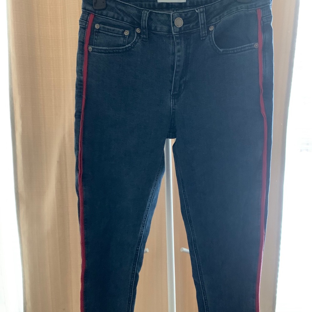Blue jeans with red line down side
